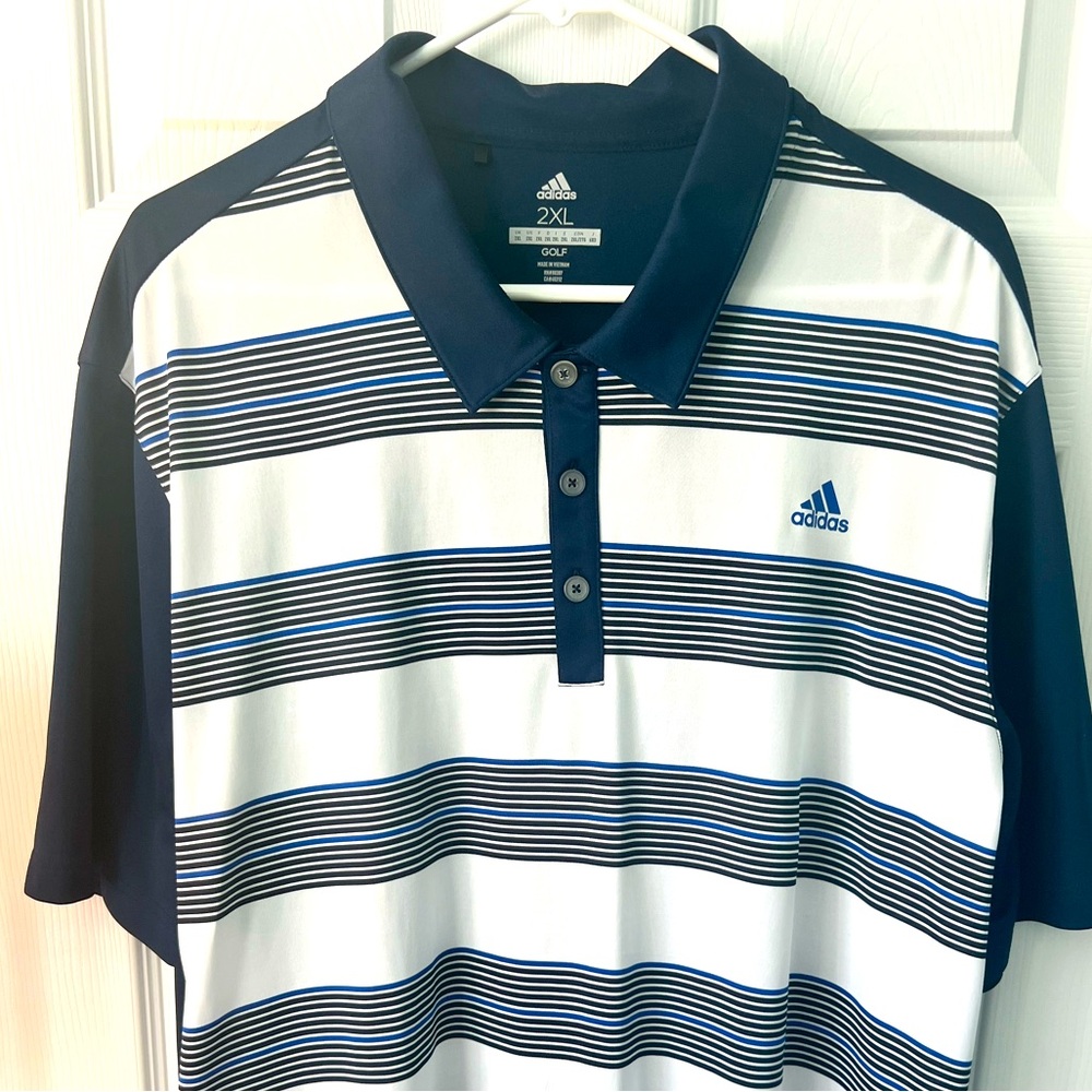 Adidas golf polo shirt, blue with black and white stripes.